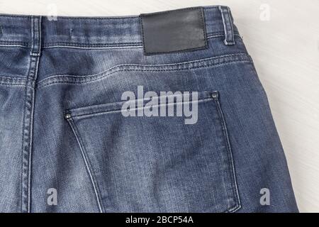 Denim-Hose, Fragment mit Rückentasche Stockfoto