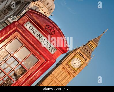 Coronavirus auf der British Bright Red Telephone Box und Big Ben, London, England, Großbritannien Stockfoto