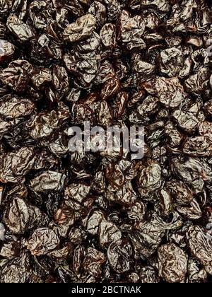 Viele getrocknete Pflaumen zum Essen von Background Stockfoto