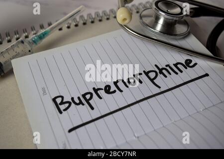 Buprenorphin schreiben auf ein Buch und ein Stichwort isoliert auf Office Desk. Konzept Gesundheitswesen/Medizin Stockfoto