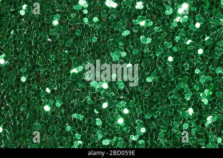 Grüner Hintergrund mit Kontrast und Glitter. Perfekte Textur für Ihr elegantes Design. Stockfoto