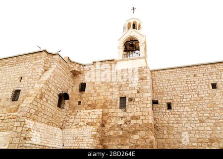 Der Uhrturm an der Geburtskirche in Bethlehem. Das Gebäude ist auch ein Armenklosterei. Stockfoto