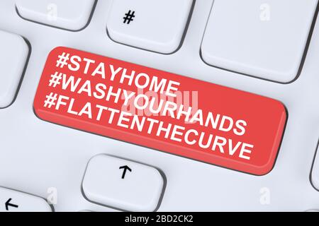 Bleiben Sie zu Hause Hashtag stayhome flachen Sie die Kurve Corona-Virus Coronavirus gesunde Gesundheit Computer Tastatur Internet Stockfoto