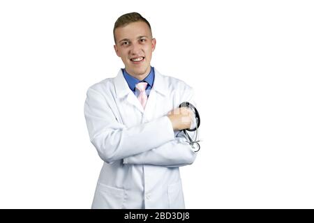 Junger Arzt oder Medizinstudentin in weißer Robe mit Stethoskop auf weißem Hintergrund Stockfoto