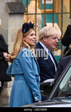 London, Großbritannien. April 2020. DATEIFOTO Boris Johnson, Premierminister, auf Intensivpflege mit COVID 19-Symptomen, während Fiance Carrie Symonds sich zu Hause selbst isoliert. Foto aufgenommen am 9. März 2020. Boris Johnson, Premierminister, und Fiance Carrie Symonds verlassen die Westminster Abbey, nachdem sie am Commonwealth Day den jährlichen Gottesdienst besucht haben. Kredit: Stephen Chung / Alamy Live News Stockfoto