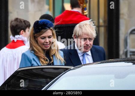 London, Großbritannien. April 2020. DATEIFOTO Boris Johnson, Premierminister, auf Intensivpflege mit COVID 19-Symptomen, während Fiance Carrie Symonds sich zu Hause selbst isoliert. Foto aufgenommen am 9. März 2020. Boris Johnson, Premierminister, und Fiance Carrie Symonds verlassen die Westminster Abbey, nachdem sie am Commonwealth Day den jährlichen Gottesdienst besucht haben. Kredit: Stephen Chung / Alamy Live News Stockfoto