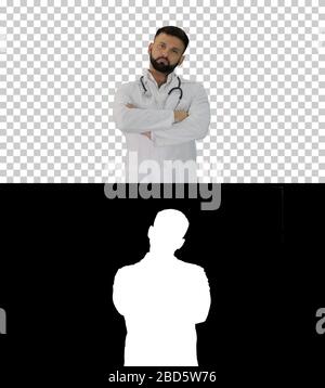 Junger kaukasischer Arzt mit gefalteten Händen, Alpha ch Stockfoto