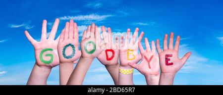 Children Hands Building Word Goodbye, Blue Sky Stockfoto