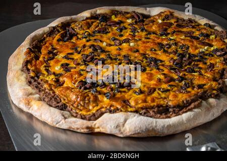 Taco Pizza, Unterlage. Stockfoto