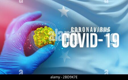 Coronavirus COVID-19 Outbreak-Konzept, gesundheitsgefährdendes Virus, Hintergrund schwenkende Nationalflaggen Mikronesiens. Pandemie stoppt Roman Coronavirus Stockfoto
