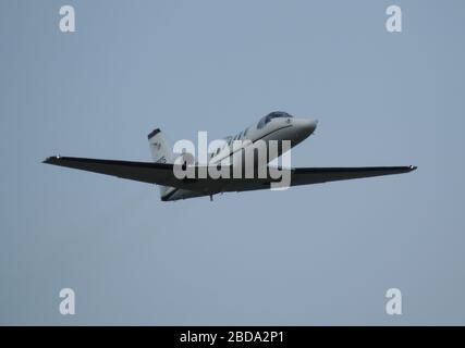 97-0105, eine Cessna UC-35A Citation der United States Army, die vom Flughafen Prestwick in Ayrshire abfährt. Stockfoto