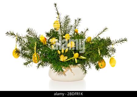 Asterschmuck mit Ostereiern und Eibenästen Stockfoto