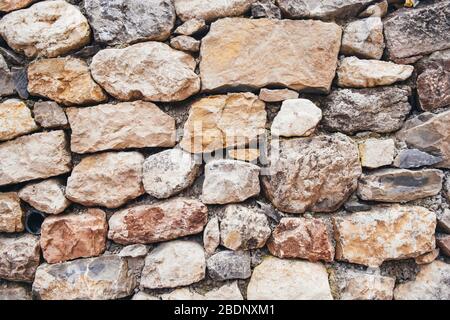 Wand aus großen Steinen, natürliche Hintergrund. Großartig für das Design und die Textur Hintergrund. Stockfoto
