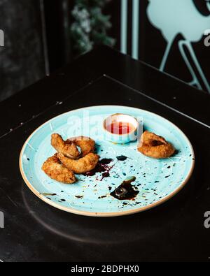 Gebratene Nuggets mit süßem Chili Stockfoto