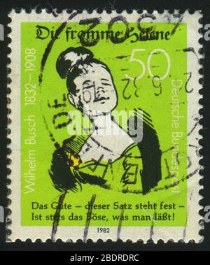 DEUTSCHLAND - UM 1982: Briefmarke gedruckt von Deutschland, zeigt Porträt die Fromme Helene, von Wilhelm Busch, um 1982. Stockfoto