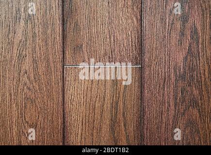 Holzstruktur. Strukturierter Hintergrund. Braun und rosa Farbe. Stockfoto