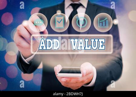 Handschriftentext Wert hinzufügen. Konzeptionelles Foto eine Verbesserung oder Ergänzung zu etwas, das es wert mehr macht Stockfoto