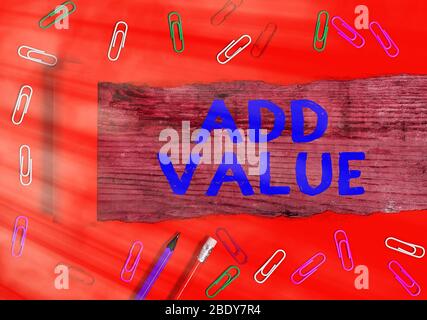 Handschriftentext Wert hinzufügen. Konzeptionelles Foto eine Verbesserung oder Ergänzung zu etwas, das es wert mehr macht Stockfoto