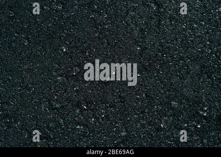 Oberfläche Asphalt. Nahtlose Asphalt Beton dunkelgrau Getreidestraße. Schwarze Textur Hintergrund Draufsicht. Stockfoto