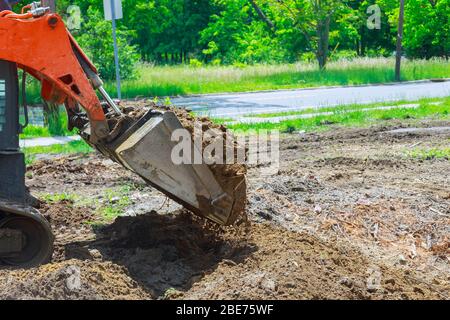 Der Bulldozer bewegt Bodengräberbaugeräte Stockfoto