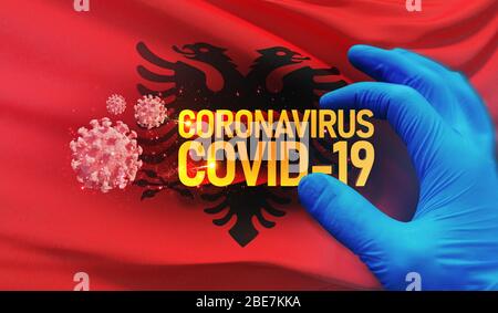 Coronavirus COVID-19 Outbreak-Konzept, gesundheitsgefährdendes Virus, Hintergrund schwenkende Nationalflaggen Albaniens. Pandemie stoppt den neuartigen Ausbruch von Coronavirus Stockfoto