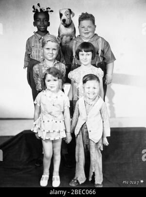 UNSERE BANDE 1930 Gruppenporträt mit (von oben) ALLEN '' FARINA '' HOSKINS PETE der HUND NORMAN '' MOLLIG '' CHANEY JACKIE COOPER MARY ANN JACKSON DOROTHY DeBORBA und BOBBY '' WHEEZER '' HUTCHINS Regisseur Robert McGowan Hal Roach Studios / Metro Goldwyn Mayer Stockfoto