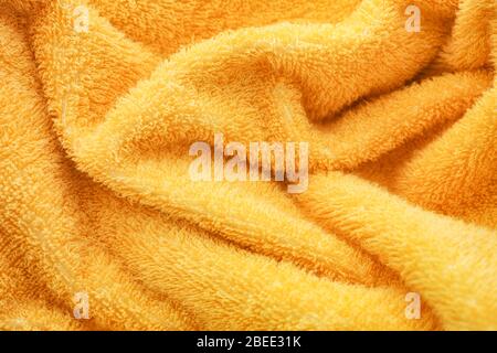 Gelbe Handtuch Textur Hintergrund. Nahaufnahme. Stockfoto