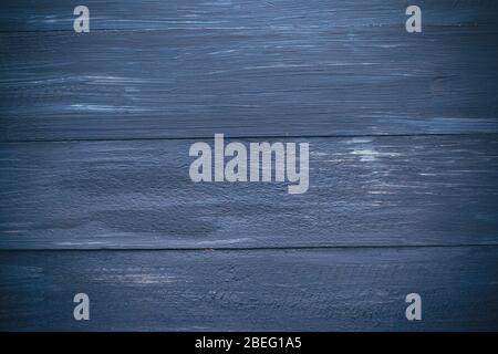 Dunkelblauer Hintergrund von bemalten Brettern, Kopierraum, Design, horizontales Banner Stockfoto