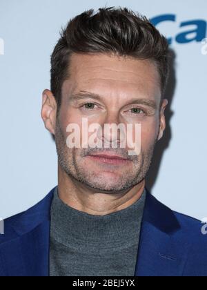 Las Vegas, Usa. April 2020. (FILE) Ryan Seacrest spendet 1 Million Dollar an Ersthelfer in New York und Los Angeles inmitten der COVID-19-Pandemie des Coronavirus. LAS VEGAS, NEVADA, USA - SEPTEMBER 21: Die amerikanische Radiopersönlichkeit Ryan Seacrest posiert im Presseraum während des iHeartRadio Music Festivals 2018 - Nacht 1, das am 21. September 2018 in der T-Mobile Arena in Las Vegas, Nevada, USA, abgehalten wird. (Foto von Xavier Collin/Image Press Agency) Quelle: Image Press Agency/Alamy Live News Stockfoto