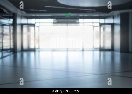 Hintergrund der Eingangshalle, Bild außerhalb der Fokus. Glastore eines Business Centers oder Einkaufszentrums, Soft Focus Stockfoto