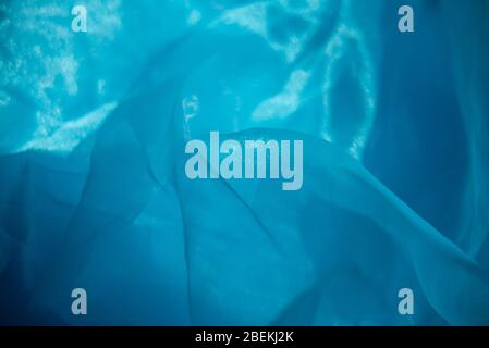 Hellblaue Textur als Hintergrund verwendet. Blaue leichte Stoffstruktur Stockfoto