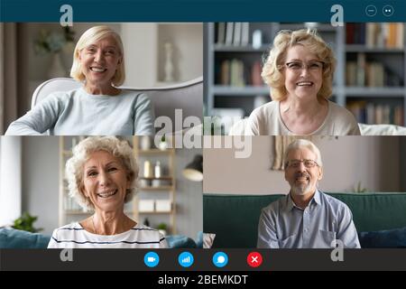 Vier Senioren Menschen an Gruppe Videocall Laptop Webcam Ansicht beteiligt Stockfoto