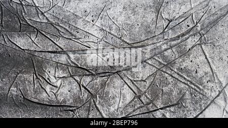 Detail eines Betonblocks mit einem Aufdruck einer Folie Stockfoto