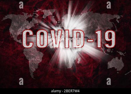 Zusammengesetztes Bild des globalen Coronavirus-Pandemiekonzepts - rot getönte Grunge-Weltkarte mit COVID-19 Text Stockfoto