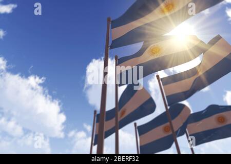 Argentinische Flaggen winken im Wind gegen einen blauen Himmel. 3D-Rendering Stockfoto