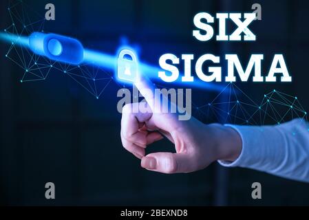 Schreibnotiz mit Six Sigma. Geschäftskonzept für eine Reihe von Managementtechniken, die zur Verbesserung von Geschäftsprozessen dienen Stockfoto