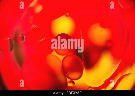 Hintergrund, bunte Kugeln, Unschärfe, Textur, heterogene Farbe, rot-gelber Ton Stockfoto