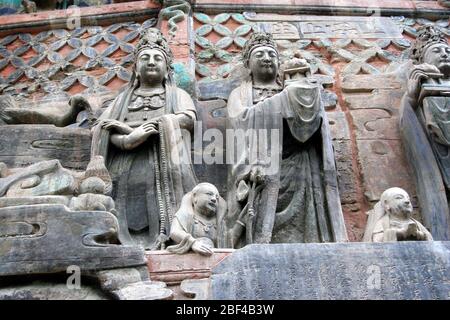 Eine der Gruppenschnitzereien von Surving the Unsterblichen Buddhist Sutra in Baodingshan Cliff Dazu Steinschnitzerei Chongqing Stockfoto