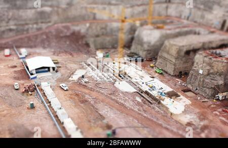Luftaufnahme der Baustelle mit Tilt-Shift Effekt, Baustelle Outdoor Luftaufnahme von oben. Stockfoto