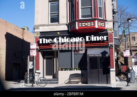 Chicago, Illinois, USA. Ein farbenfroher Abschnitt der Halsted Street auf der Nordseite der Stadt im Lake View East-Viertel, auch bekannt als Boystown. Stockfoto