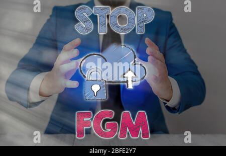 Konzeptionelle Handschrift mit Stop FGM. Konzept Bedeutung Schluss mit Genitalschnitt und Beschneidung Stockfoto