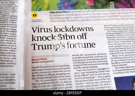 Coronavirus Covid-19 "Virensperren schlagen 1 Milliarde Dollar von Trumps Vermögen ab" Guardian Zeitung inside page Headline article 8 April 2020 London England UK Stockfoto