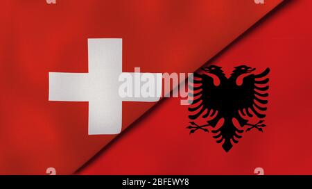 Zwei Staatsflaggen der Schweiz und Albaniens. Qualitativ hochwertiger Hintergrund. 3d-Darstellung Stockfoto