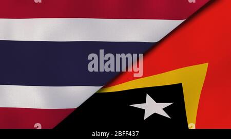 Zwei Staatsflaggen von Thailand und Osttimor. Qualitativ hochwertiger Hintergrund. 3d-Darstellung Stockfoto