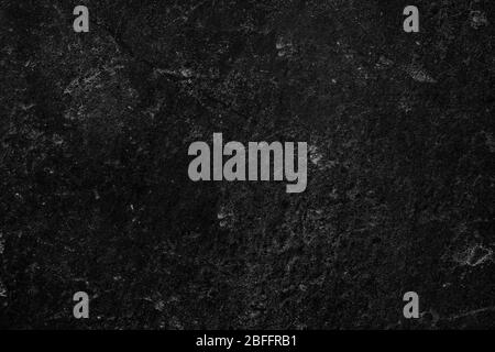 Abstrakter schwarzer Stein Hintergrund und Textur Stockfoto