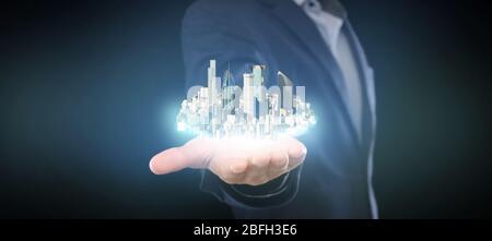 Mann im Anzug hält Stadt auf seiner Hand, Doppelbelichtung Hologramm Stockfoto