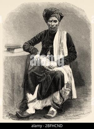 Porträt des Baniano-Händlers von Surat, Gujarat. Indien. Alte Gravurillustration aus El Mundo en la Mano 1878 Stockfoto