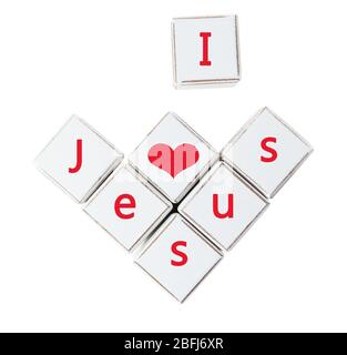 Ich liebe Jesus Text geschrieben in Würfel isoliert auf weiß Stockfoto