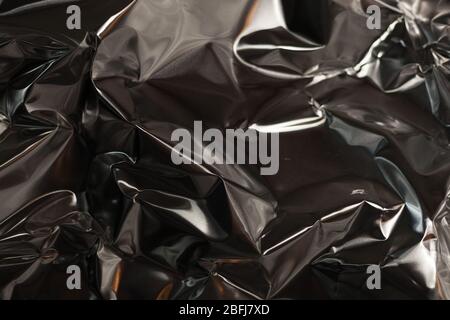 Full Frame nehmen Sie ein Blatt zerknüllt silberne Aluminiumfolie Hintergrund Stockfoto