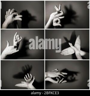 Hände Geste wie verschiedene Tiere und Figuren auf grauem Hintergrund Stockfoto